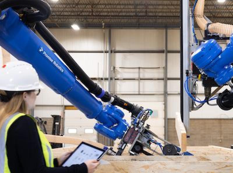 Housing components being assembled by robots at Promise Robotics' Edmonton facility. (Courtesy Promise Robotics