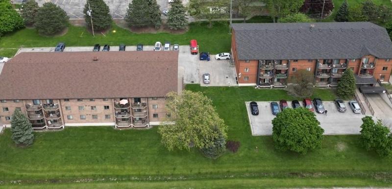 Richmond Asset Mgmt. has acquired these two apartment buildings at 2940 and 2950 Elsmere Ave. in Windsor. (Courtesy Richmond)