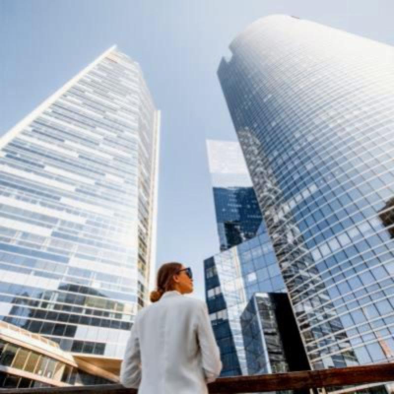A city skyline meets digital circuitry, symbolizing technology-driven transformation in modern real estate.