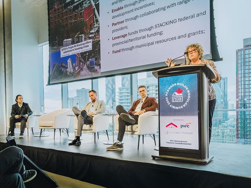Speaking at the Canada Builds Modular Summit in October, City of Calgary chief planner and director of community planning, Dr. Teresa Goldstein shares how the city is working to pilot new policies and conditions to better support modular real estate developments. (Courtesy Front Row Images Inc.)