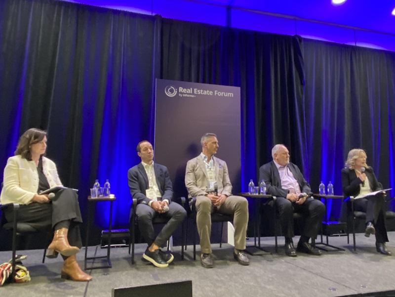 Speakers during the Real Estate Forum hotels panel, from left: Carrie Russell of HVS; Knightstone Capital Management's Alan Perlis; CFO Capital's Mark Kay; Sunray Group's Kenny Gibson; and Colliers' Robin McLuskie. (Steve McLean RENX)