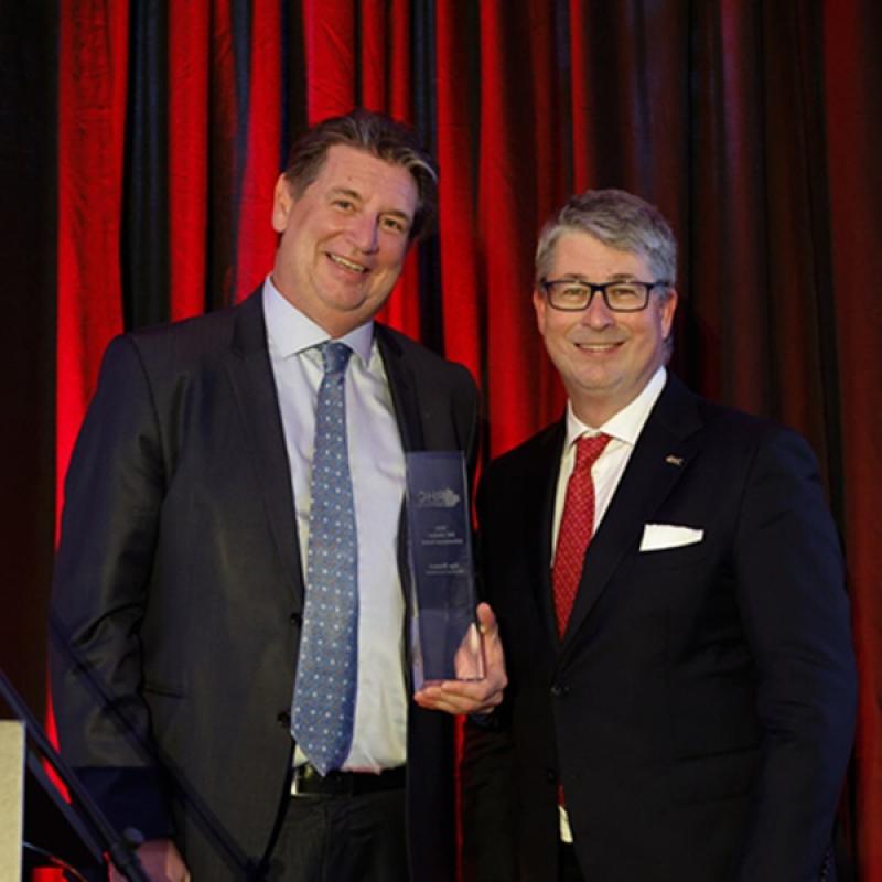Ugo Bizzarri accepting Lifetime Achievement Award from Tony Irwin ( Courtesy Hazelview Investments)