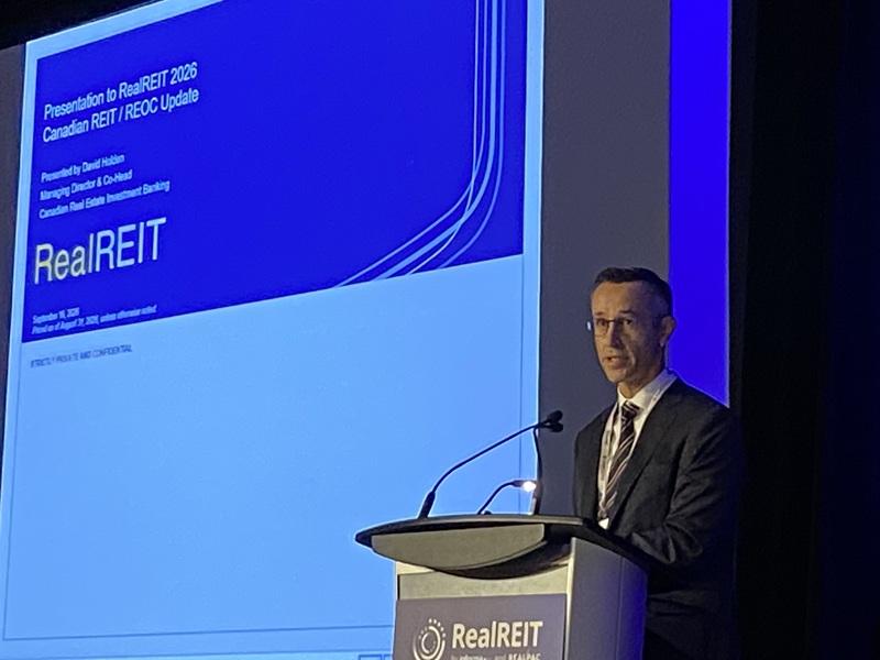 RBC MD and co-head of Canadian real estate investment banking David Holden speaks at yesterday's REAL REIT conference. (RENX/McLean)